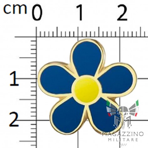 Spilla metallica raffigurante il fiore Myosotis (Non Ti Scordar Di Me) di colore azzurro, simbolo dei Caduti per la Patria.
